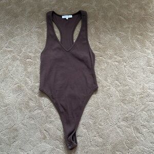 Brown body suit